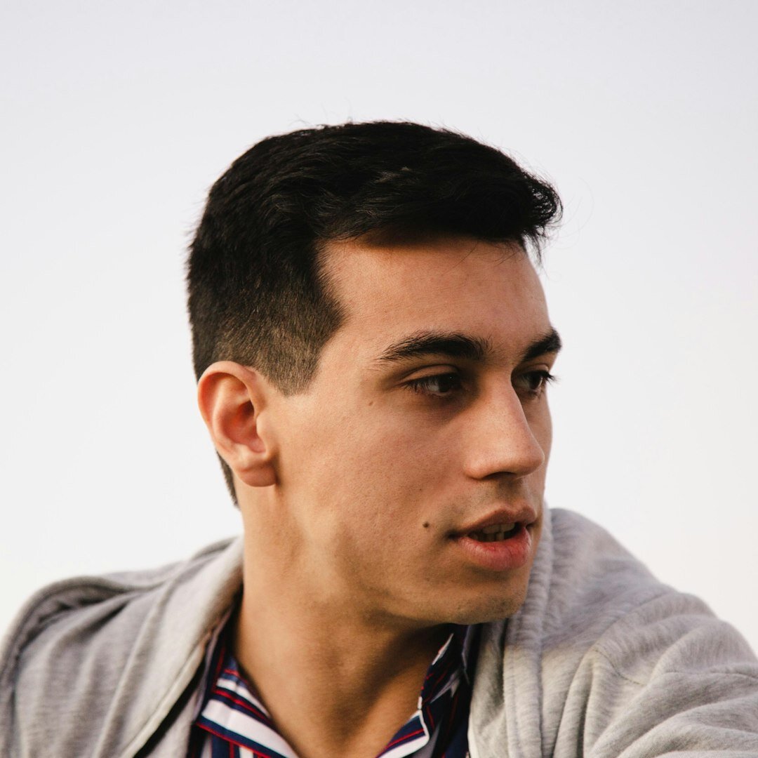 Chilean male editor and writer with glasses and beard