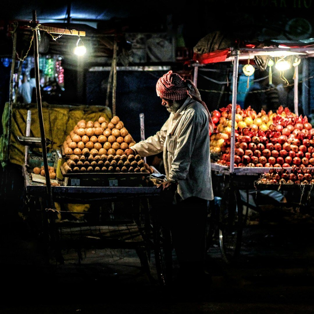 Chilean street vendor selling fruit at a market in Santiago